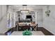 Dining area offers a view into the living room with large screen TV at 127 Grayson Myers Dr, Villa Rica, GA 30180
