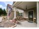 A cozy porch swing and a Georgia Bulldogs flag welcome guests to this lovely home at 127 Grayson Myers Dr, Villa Rica, GA 30180