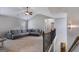 Upstairs living room boasts plush seating, a cozy atmosphere, and seamless access to other areas of the home at 127 Grayson Myers Dr, Villa Rica, GA 30180