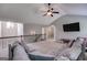Spacious upper-level living room features vaulted ceiling, railing, and large sofa at 127 Grayson Myers Dr, Villa Rica, GA 30180