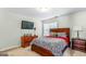 Cozy bedroom with a full-sized bed, dresser, and ample closet space at 176 Fairoaks Cir, Stockbridge, GA 30281