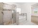 Modern bathroom featuring a glass enclosed shower and a separate soaking tub at 1812 Quaker St, Hampton, GA 30228