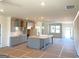 Spacious kitchen with island, gray cabinets, and abundant lighting at 1812 Quaker St, Hampton, GA 30228