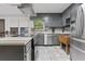 Updated kitchen with stainless steel appliances and functional layout at 2371 Leguin Mill Rd, Locust Grove, GA 30248