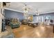 Comfortable living room with hardwood floors and stone fireplace at 2371 Leguin Mill Rd, Locust Grove, GA 30248