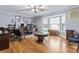 Office with wood floors, a ceiling fan, and large windows for natural light at 2371 Leguin Mill Rd, Locust Grove, GA 30248