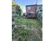 Backyard with patio and privacy fence at 6444 Charter Way, Lithonia, GA 30058