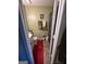 Bathroom featuring a white vanity, toilet, and olive green walls at 6444 Charter Way, Lithonia, GA 30058