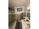 Bathroom featuring glass enclosed shower, tile flooring, and gray vanity at 6444 Charter Way, Lithonia, GA 30058