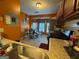 Cozy kitchen with stainless steel appliances and bright adjacent dining area at 6444 Charter Way, Lithonia, GA 30058