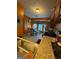 Cozy kitchen with stainless steel appliances and bright adjacent dining area at 6444 Charter Way, Lithonia, GA 30058