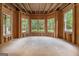 Unfinished basement featuring natural light from multiple windows, ready for personalized design and finishing at 115 Edgewood Pkwy, Fayetteville, GA 30215