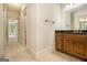 Bathroom featuring vanity with granite counters and wood cabinets at 115 Edgewood Pkwy, Fayetteville, GA 30215