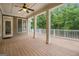 The outdoor deck has a ceiling fan for comfort at 115 Edgewood Pkwy, Fayetteville, GA 30215