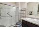 Bathroom featuring a glass-enclosed shower and neutral decor at 5396 Pennington Ct, South Fulton, GA 30349