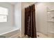 Bright bathroom with tub, shower, and modern fixtures at 5396 Pennington Ct, South Fulton, GA 30349