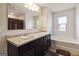 Bathroom with double vanity sinks, bathtub, and tile flooring at 5396 Pennington Ct, South Fulton, GA 30349