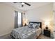 Bedroom with a bed, nightstands, and curtains at 5396 Pennington Ct, South Fulton, GA 30349