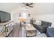 Cozy bonus room featuring sofa, TV, foosball table, and decor at 185 Chimney Springs, Tyrone, GA 30290