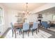 Bright dining room with views of fireplace, table, and chairs at 185 Chimney Springs, Tyrone, GA 30290