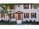 Close-up of a freshly painted white brick home with a new front door and shutters at 185 Chimney Springs, Tyrone, GA 30290