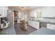 Bright kitchen with modern appliances, a movable island, and white cabinets at 185 Chimney Springs, Tyrone, GA 30290