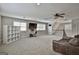 Spacious main bedroom with a flatscreen TV, and open staircase at 210 Short Rd, Sharpsburg, GA 30277