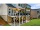 Spacious backyard deck with outdoor seating and an umbrella at 10140 Grandview Sq, Duluth, GA 30097