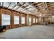 Unfinished basement provides a spacious area with exposed framing and natural light at 10140 Grandview Sq, Duluth, GA 30097