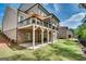 Charming backyard view with a spacious deck perfect for outdoor entertaining at 10140 Grandview Sq, Duluth, GA 30097