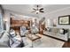 Comfortable living room offering an open layout to the kitchen and staircase at 10140 Grandview Sq, Duluth, GA 30097