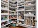Well-organized walk-in pantry with ample shelving and storage space for kitchen essentials at 10140 Grandview Sq, Duluth, GA 30097