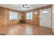 Living room with wood paneling and wood flooring at 40 N Villa Rd, Villa Rica, GA 30180