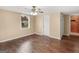 Bedroom featuring hardwood floors, natural light, and entry door at 3 Ridge Dr, Hampton, GA 30228