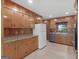Cozy kitchen featuring wood cabinets, countertops, and stainless steel dishwasher and sink at 3 Ridge Dr, Hampton, GA 30228