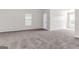 Carpeted bedroom with neutral walls and window for natural light at 3130 Lower Creek Dr, Douglasville, GA 30135