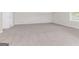 Bonus room featuring neutral walls and plush carpet at 3130 Lower Creek Dr, Douglasville, GA 30135
