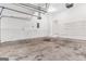 Clean two-car garage featuring an electric garage door opener at 3130 Lower Creek Dr, Douglasville, GA 30135