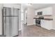 Modern kitchen featuring stainless steel appliances, white cabinetry and stone countertops at 3130 Lower Creek Dr, Douglasville, GA 30135