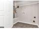 Laundry room with tile flooring and wire shelving at 3130 Lower Creek Dr, Douglasville, GA 30135