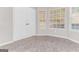 Cozy living area featuring natural light, closet and neutral tones at 3130 Lower Creek Dr, Douglasville, GA 30135