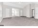 Spacious living room featuring neutral walls and plush carpet at 3130 Lower Creek Dr, Douglasville, GA 30135