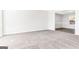 Bright living room featuring neutral carpet, white walls, and an open layout at 3130 Lower Creek Dr, Douglasville, GA 30135