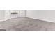Spacious room with neutral carpet and light walls, providing a blank canvas at 3130 Lower Creek Dr, Douglasville, GA 30135