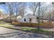 Charming craftsman-style home with a welcoming front porch and a well-maintained fenced yard at 1267 Lyle Nw Pl, Atlanta, GA 30318