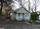 Quaint home featuring a covered front porch and a cozy facade at 1267 Lyle Nw Pl, Atlanta, GA 30318