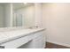 Well-lit bathroom features a modern vanity with granite counters and white cabinets at 244 Oliver Dr, Locust Grove, GA 30248