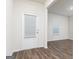 The entryway features hardwood floors and a stylish door with window at 244 Oliver Dr, Locust Grove, GA 30248