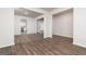 The spacious living room features hardwood floors and provides views into other rooms at 244 Oliver Dr, Locust Grove, GA 30248
