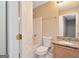 Bright bathroom featuring a shower-tub combo with granite countertop sink at 145 Tara Way, Covington, GA 30016